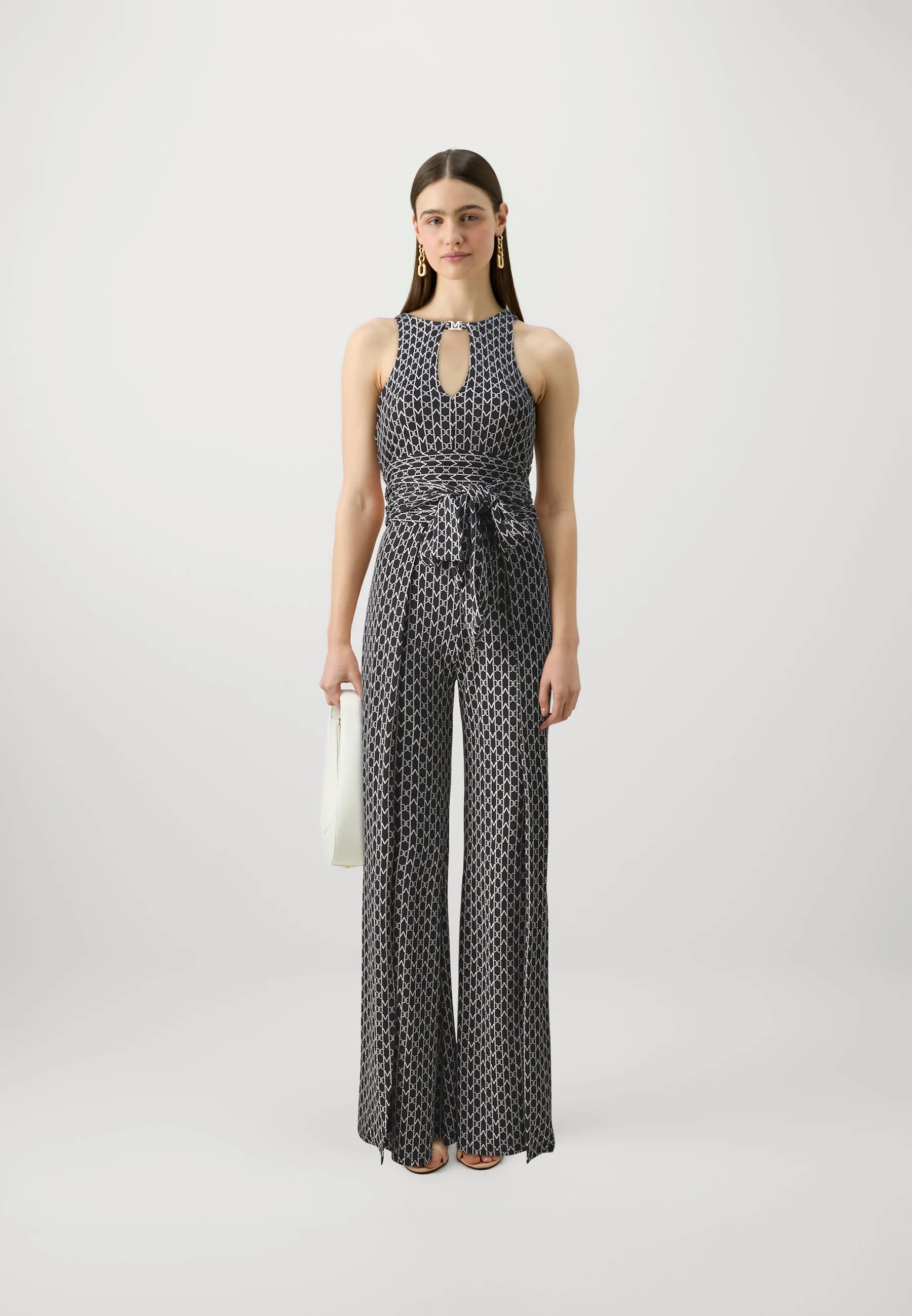 Marciano by Guess New Kiki Jumpsuit – Black in stylish patterned fabric, perfect for women's fashion and special occasions.
