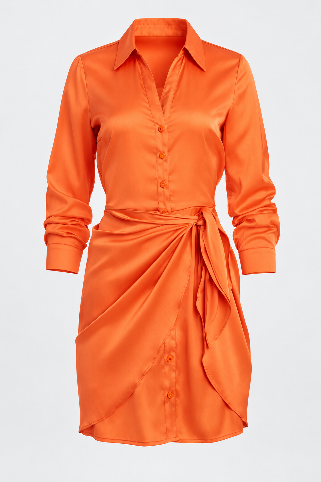 Front studio view of the orange Guess satin shirt dress, showing the classic collar, long sleeves, button fastening and wrap bow detail.