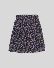 MSCH Copenhagen Kasandra Orabella skirt in black with lavender floral print, gathered waistband and gently flared hem, front view.